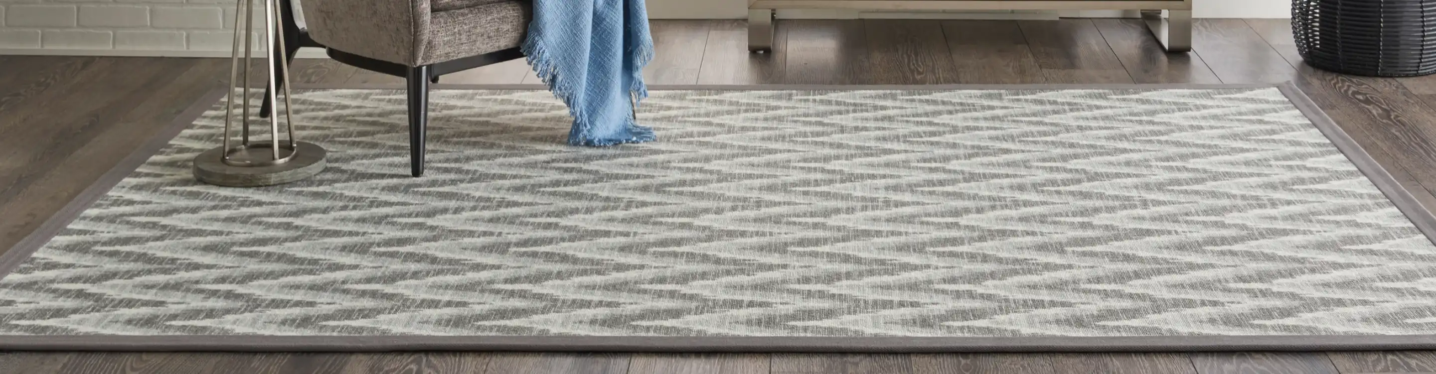 grey patterned area rug in living room